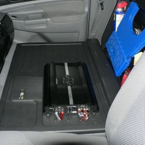 Amp mounted to back of seat