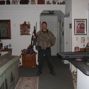 rifle_in_house