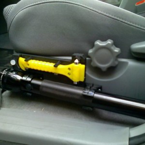 Flashlight & glass break tool mount
