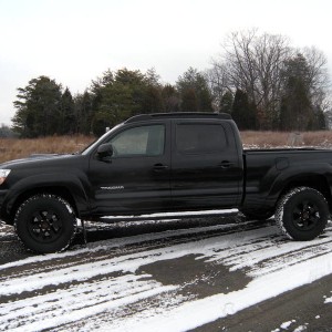 side view with new wheels/tires.