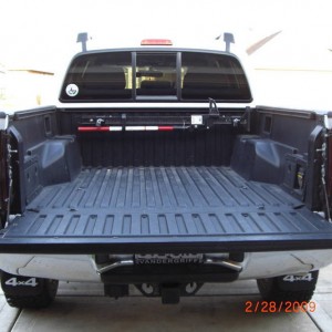 Truck bed with mounted Hi Lift jack