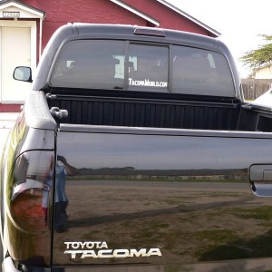 tinted tails and tacomaworld.com sticker