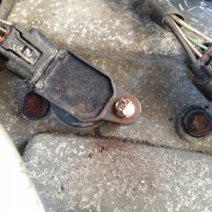 Rounded bolt on coil pack