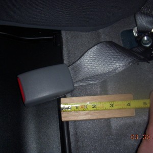Rear seatbelt stiffener