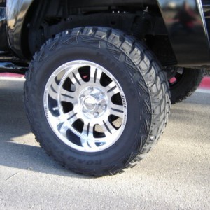 Eagle Alloy 140 series Superblack finish  18x10 w/ 33x12.5x18 Kumho M/T's