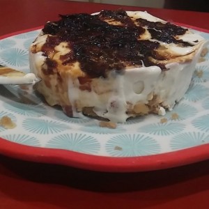Dried, reconstituted, cinnamon apple no bake cheese cake with funnel cake crust... It's a mouth full and my mouth is full of it