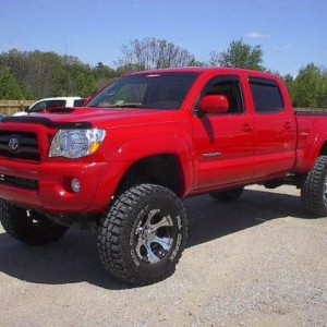6" Pro Comp Lift, 35" Dick Cepek Mud Country Wheels and Tires