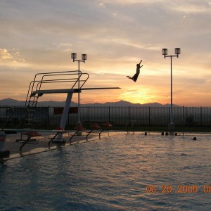 My son jumping of the high dive.