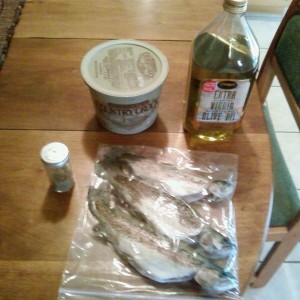 Preparing the days catch for dinner. MMMM....fresh trout!