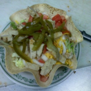 Chicken salad in a baked tortila bowl we make em at my restaurant it was lu
