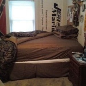 my new bed with camo sheets..lol