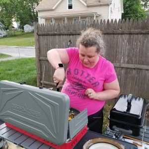 Rachel making sausage and eggs