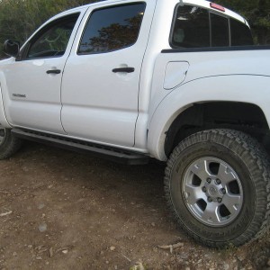 back left wheel off the ground...by an inch...