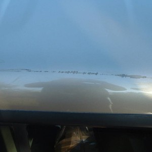 Rear edge of cab roof scratches
