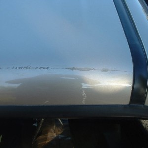 Rear edge of cab roof scratches