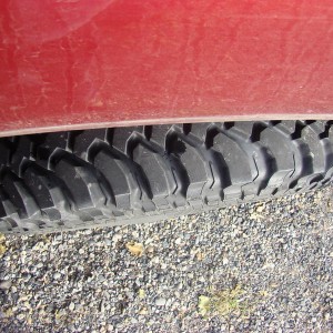 Trail damage - Giant Rock on Rear Left Tire