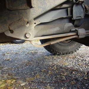 Trail damage - Giant Rock on Rear Left Tire