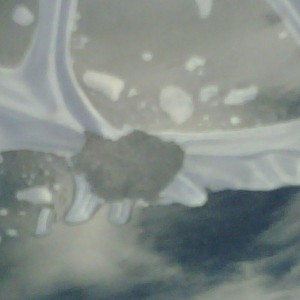 Clear laminate on deflector started to web.