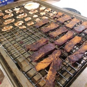 Getting close. Enough room to spread them onion rings out now also may of had to sample some jerky...