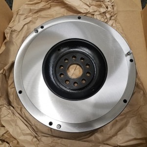 OEM (160k) flywheel got a makeover. Soaked in metal rescue for 2 days, 3 coats of primer, paint and clear, followed up with a trip to the machine shop