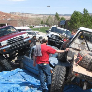 Three Toyota's on a car