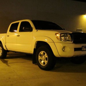 2009 super white double cab 2 wd tint stereo de badged badge