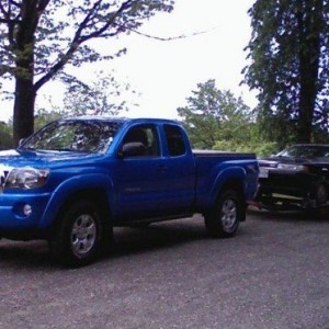 Towing the car back from the dealer.