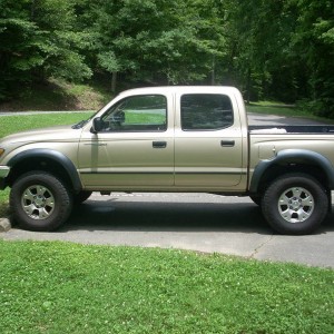 With 3" lift and New Wheels