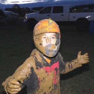 My son, Cameron lovin that mud bath!