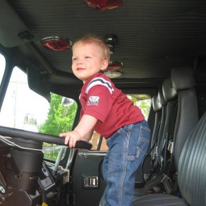 Little man driven the fire truck