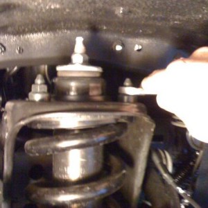 remove 3 upper shock mount nuts