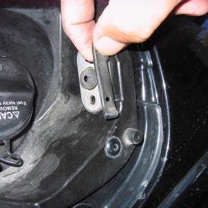 Electric opener fuel door
