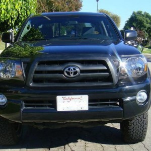 Black headlights from ebay (revotec) and color matched grille (me)