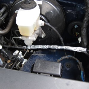 Block heater cord routing