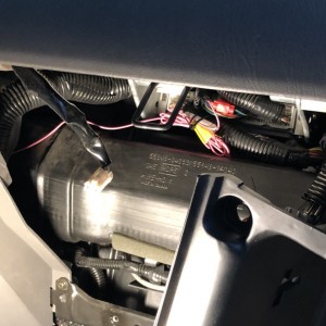Glove box opening to Vehicle Speed Sensor connection