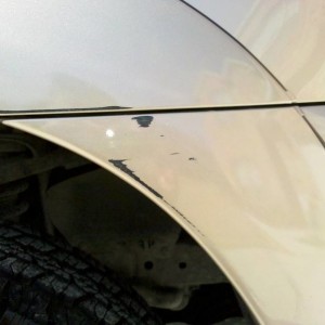 scrape on the fender flare