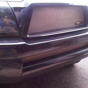 Washed, fixed fogged headlight & FINALLY installed the grill triangles 