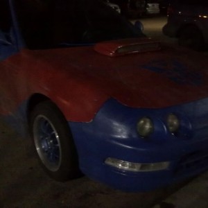 Optimus Prime in his youth complete with overly large screwed on hood scoop