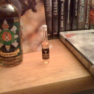 Smallest mini bottle ever...and yes that liquor in it