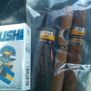 Dollar pack of cigs and some good cigars....real cohibas!