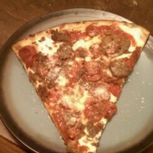 Now that's a slice of pizza Grimaldis Coal Fire Pizza FTW!