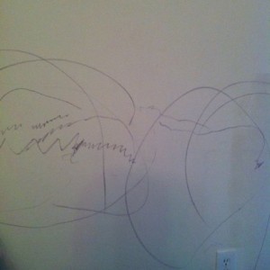 Lovely drawings on my wall courtesy of my little brother lol