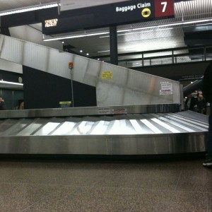 Terra Firma..... But baggage claim could hurry the fk up so I can get home.
