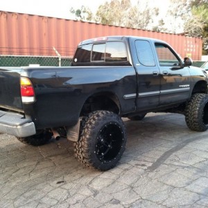 Body lift n 14in wide rims...that is called a fail my friend -_-