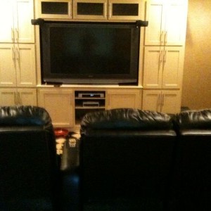 65" with massaging theater chairs. I win.