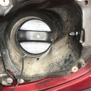 Gas cover latch pin
