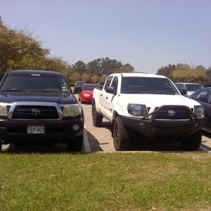 Parked by a tacoma at the club. Mine is the white one.