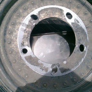 Rounded out lug holes.