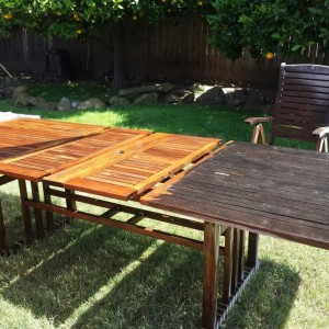 Free teak table showing that it still has plenty of life left