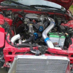 Big turbo install on 93 RX7, rotary engines are tough to work on